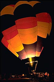 Night launch of many balloons